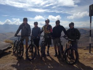 Happy bikers in Peru mountains on biking tour package