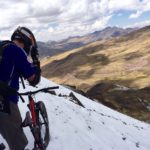 Gravity Peru Bike Team Member on snowy mountain bike trail in Cusco Peru